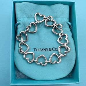 Rare Tiffany and co euc gently used Heart Clasping link in sterling Silver